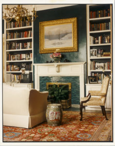 HISTORY ON HAND. Top shelves in the bookcases contain various publications on vice presidents of the past, a tradition started by Joan Mondale as she formally dedicated the room as the vice-presidential library. Finished with a distinct glazed and lacquered peacock blue, this unique area on the first floor of the residence has been known over the years as the library, sitting room, or den. Number One Observatory Circle, the official home and residence of the Vice President of the United States. (Photographer: Oberto Gili). Text credit: Charles Denyer.